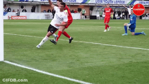 A Gatorade Ad Can Be Seen In The Background Of This Soccer Game GIF