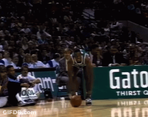 A Gatorade Ad Is On The Side Of The Court GIF