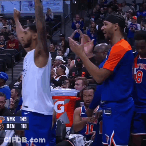 A Gatorade Bucket Sits In Front Of A Basketball Player GIF