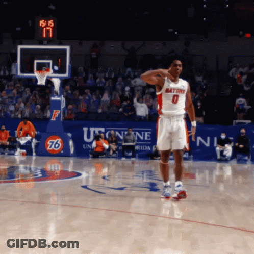 A Gators Basketball Player Stands On The Court During A Game GIF