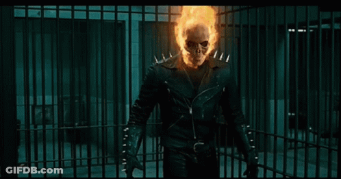 A Ghost Rider Is Holding A Gun And Saying " You Innocent " GIF