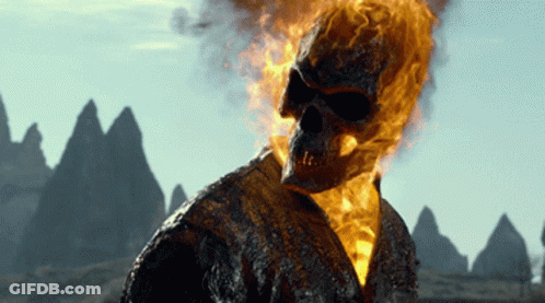 A Ghost Rider With Flames Coming Out Of His Skull GIF