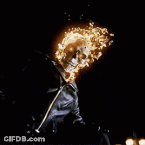 A Ghost Rider With Flames Coming Out Of Its Head GIF