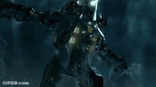 A Giant Monster With A Glowing Light Coming Out Of It 'S Mouth GIF