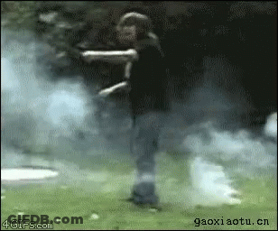 A Gif From 4Gifs.com Shows A Person Standing In The Grass GIF