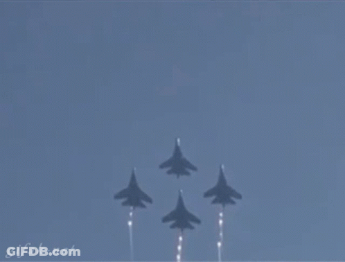 A Gif From Gifak.net Shows A Plane Flying Through The Air GIF