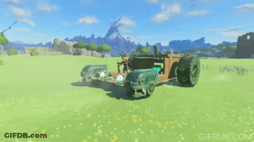 A Gif From Gifrun.com Shows A Green Car In A Field GIF