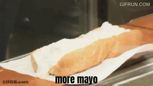 A Gif From Gifrun.com Shows A Hot Dog With Mayo GIF
