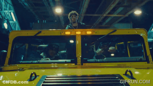 A Gif From Gifrun.com Shows A Man In A Yellow Truck GIF