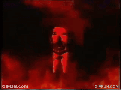 A Gif From Gifrun.com Shows A Painting Of A Man 'S Face Surrounded By Fire GIF
