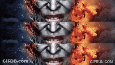 A Gif From Gifrun.com Shows A Woman 'S Face With Fire Coming Out Of Her Mouth GIF