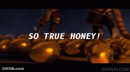 A Gif From Gifrun.com Shows Two Cats Standing On A Pile Of Gold Balls GIF