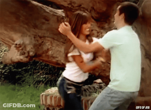 A Gif Of A Man And A Woman Hugging With The Words Gifs Of Aya Below Them GIF