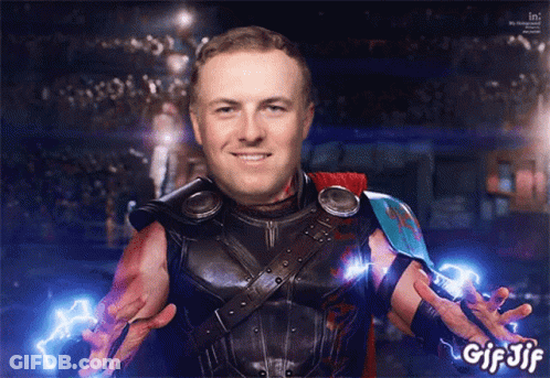 A Gif Of A Man Dressed As Thor With Lightning Coming Out Of His Hand GIF