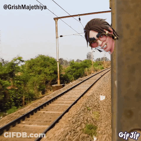 A GIF Of A Person Peeking Out Of A Train With The Words GIF Jif Below GIF