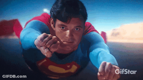A Gif Of Superman Flying Through The Air GIF