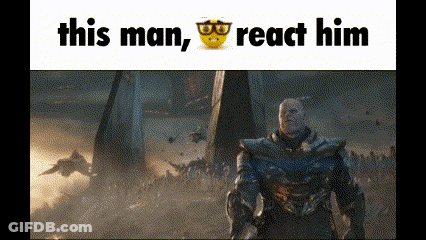 A Gif Of Thanos From The Movie Avengers Endgame Reacting To A Man Wearing Glasses . GIF
