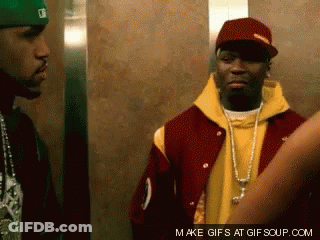 A GIF Of Two Men In An Elevator With The Words Make GIFs At Gifsoup.com Below Them GIF