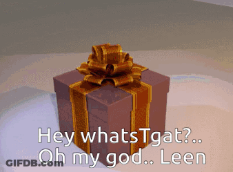 A Gift Box With A Gold Bow And The Words Hey Whatstgat Oh My God Leen GIF