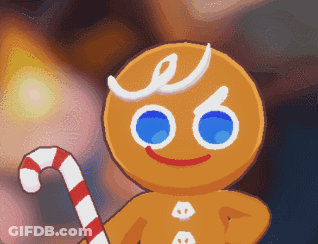 A Gingerbread Man Is Holding A Candy Cane In His Hand GIF