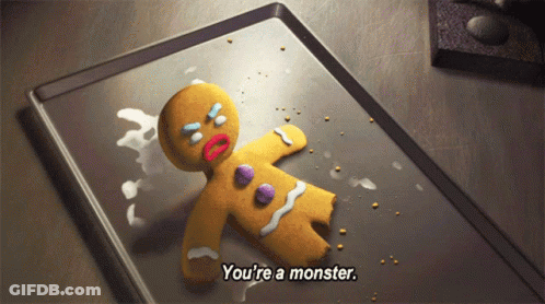 A Gingerbread Man Is Laying On A Baking Sheet And Says You 'Re A Monster GIF