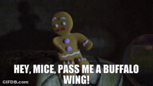 A Gingerbread Man Says Hey Mice Pass Me A Buffalo Wing . GIF