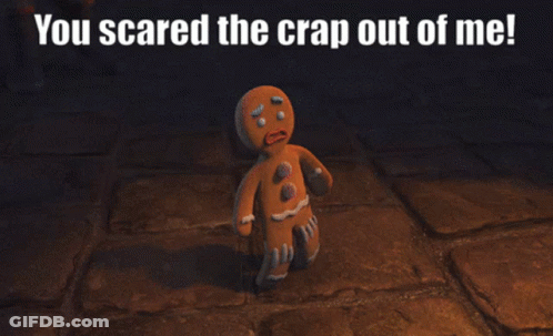 A Gingerbread Man With The Words You Scared The Crap Out Of Me Below Him GIF