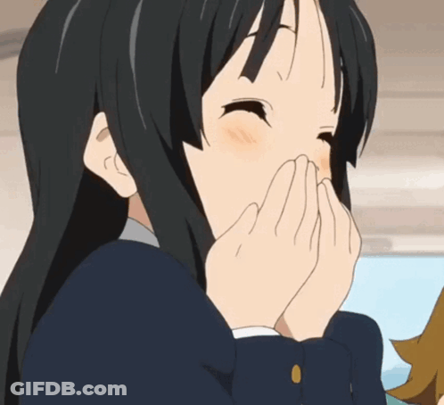 A Girl Covering Her Mouth With Her Hands And Smiling GIF