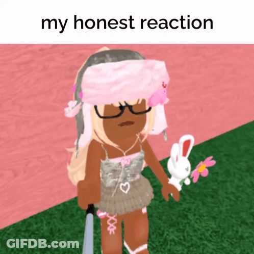 A Girl Holding A Bunny And A Flower With The Words " My Honest Reaction " Written Above Her GIF
