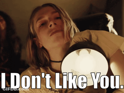 A Girl Holding A Light With The Words I Don 'T Like You GIF