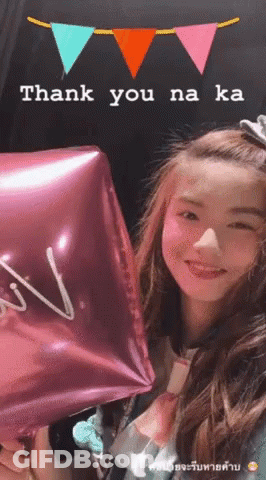 A Girl Holding A Pink Balloon That Says Thank You GIF