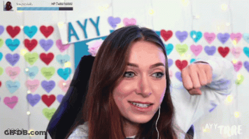 A Girl Holding A Sign That Says Ayy GIF