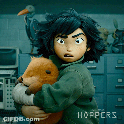 A Girl Holding A Stuffed Animal With The Word Hoppers On The Bottom GIF