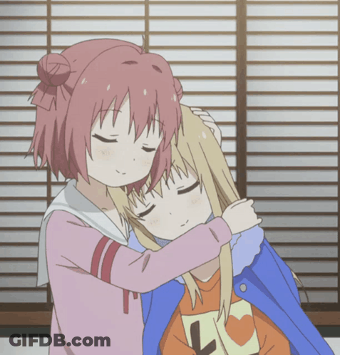 A Girl Hugging Another Girl Wearing A Shirt With The Number 7 On It GIF