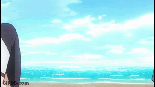 A Girl In A Bikini Is Jumping Into The Ocean GIF
