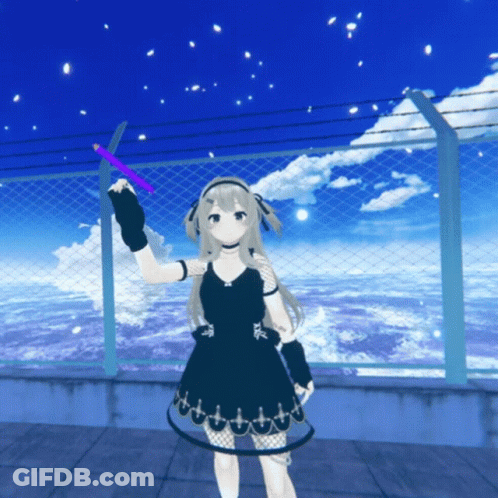 A Girl In A Black Dress Is Standing In Front Of A Chain Link Fence GIF