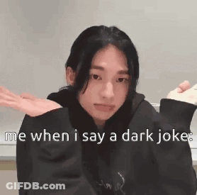 A Girl In A Black Hoodie Is Making A Funny Face While Holding A Remote Control . GIF