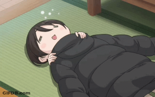 A Girl In A Black Jacket Is Laying On The Floor With Her Mouth Open GIF