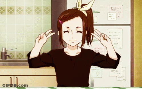 A Girl In A Black Shirt Is Making A Peace Sign With Her Hands GIF