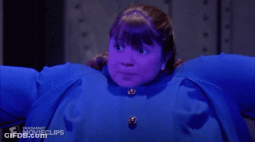A Girl In A Blue Coat With The Word Movieclips On The Bottom Of The Screen GIF