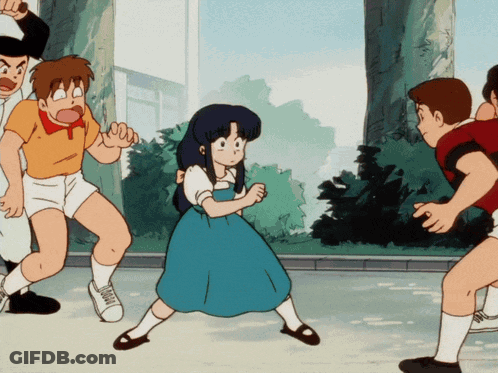 A Girl In A Blue Dress Is Surrounded By Boys GIF