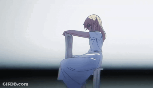 A Girl In A Blue Dress Sits On A White Chair GIF