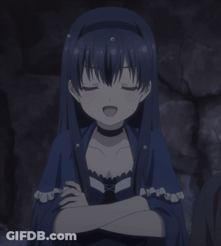 A Girl In A Blue Dress With Her Eyes Closed And Her Mouth Open GIF