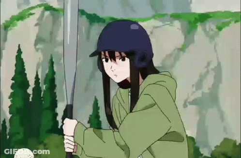 A Girl In A Blue Helmet Is Holding A Bat GIF