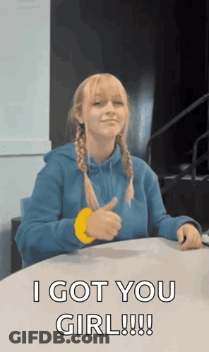 A Girl In A Blue Hoodie Is Giving A Thumbs Up And Saying I Got You Girl GIF