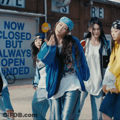 Girl In Blue Jacket In Front Of Closed Sign GIF