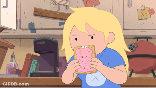 Girl In Blue Shirt Eating Toast With Sprinkles GIF