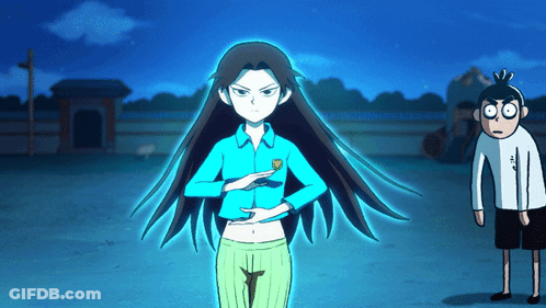 A Girl In A Blue Shirt Is Standing Next To A Boy With Big Eyes GIF