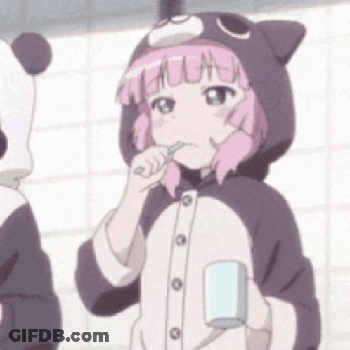 A Girl In A Cat Costume Is Brushing Her Teeth And Holding A Cup GIF