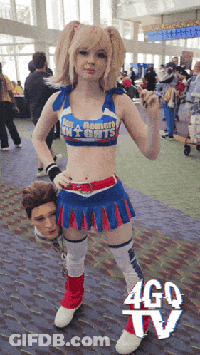 A Girl In A Cheerleader Costume With The Word Knights On The Top GIF